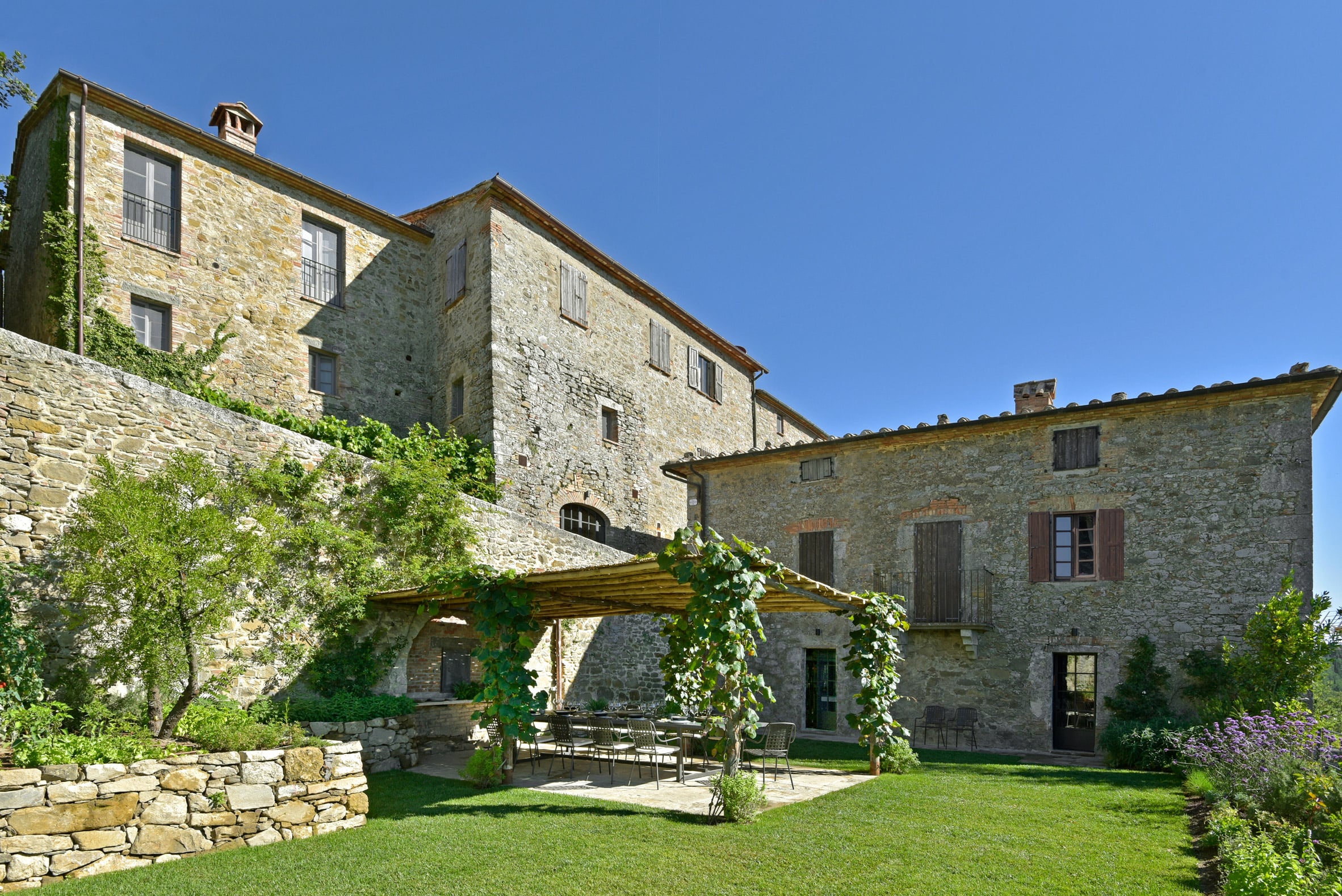 Monteverdi Resort by Ilaria Miani in Tuscany village