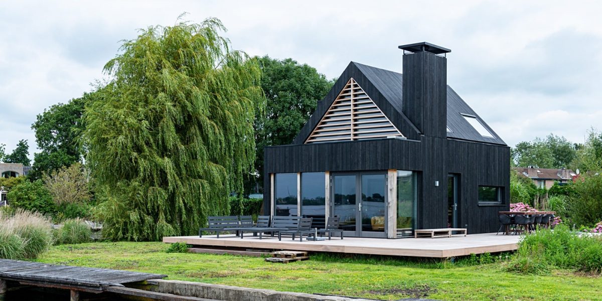 Wakacyjny dom Vinkeveen Thomas Architects nowoczesna stodoła na nabrzeżu jeziora Vinkeveen